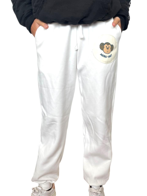 Jogger Crema Parche Mono